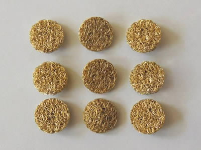 The picture shows nine same brass bowl compressed knitted mesh filters.