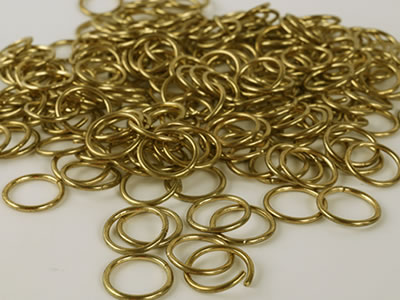 The picture shows many brass coated rings.