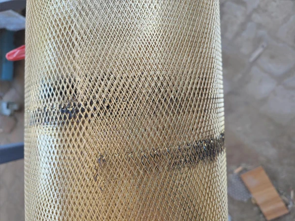 A roll of brass expanded metal mesh sample