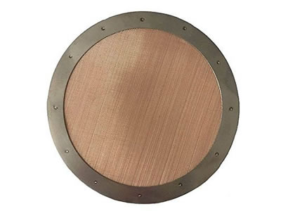 The picture shows a copper round filter disc with metal edge.