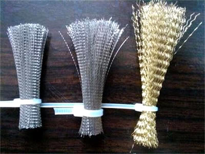 The picture shows two bunches of steel corrugate cut wire and one bunch of brass corrugate cut wire.