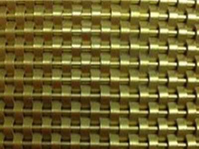 A decorative mesh which wraps are thick and flat and wefts are thin and roll.