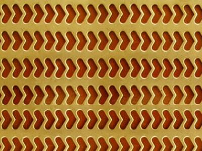 The picture shows a piece of heart shape perforated mesh.
