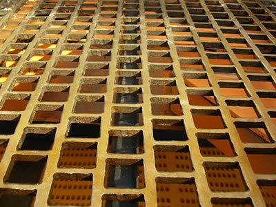 The picture shows a piece of heavy rectangle perforated mesh.