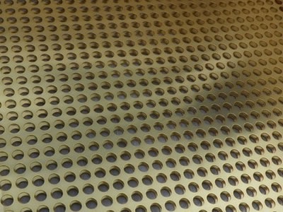The picture shows a piece of round brass perforated mesh.