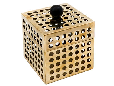 A box made of round brass perforated mesh with a black ball on the top.